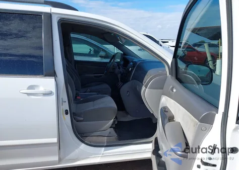 2009 Toyota Sienna Le z USA, uszkodzony, nr VIN 5TDZK23C89S285883